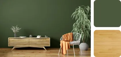 Choosing a dark green wall color to complement a warm, yellowish, light floor with a cozy undertone.